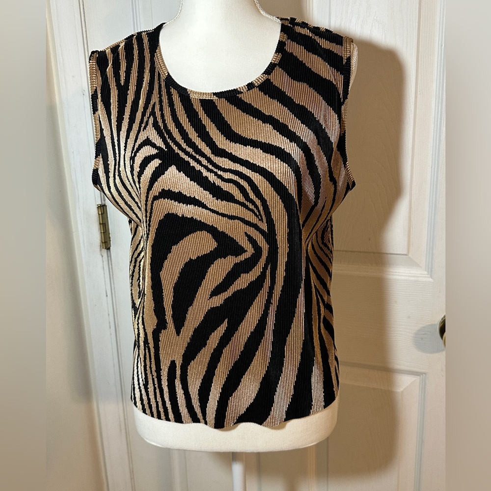 Plissé sleeveless top in a black and tan zebra print.